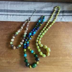Three Bakelite, wood & glass necklaces